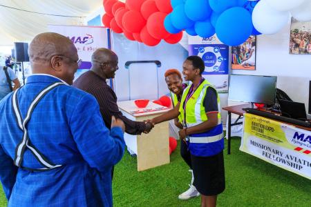 Transport Minister Katumba Wamala visits MAF stall