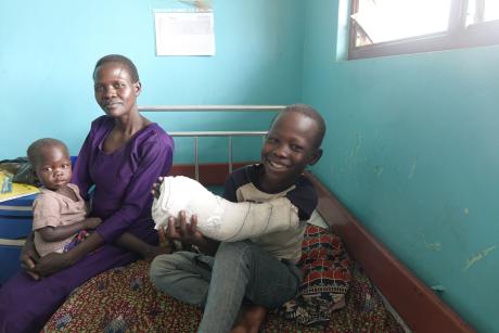 Geoffrey with his mother, Grace Adong