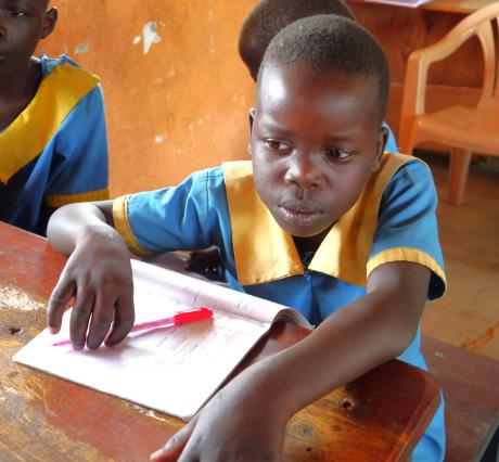 One of the pupils studying at PEACE Nursery and Primary School.