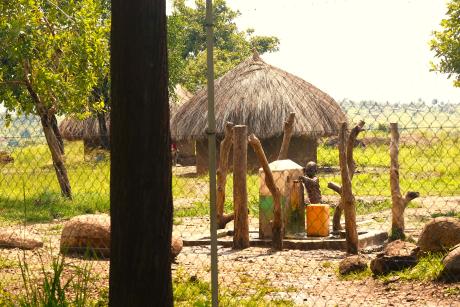 A child fetches water from a place constructed by Khayamandi Foundation.