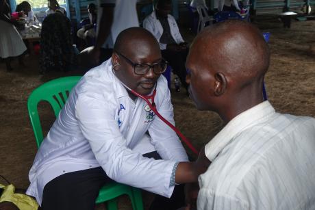 Doctor Daniel examines a patient